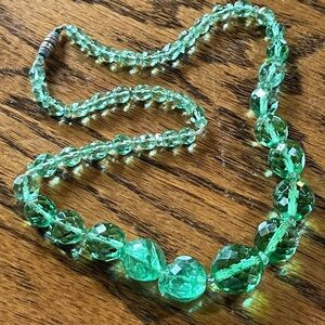 For repurposing peridot green colored faceted graduated glass bead necklace